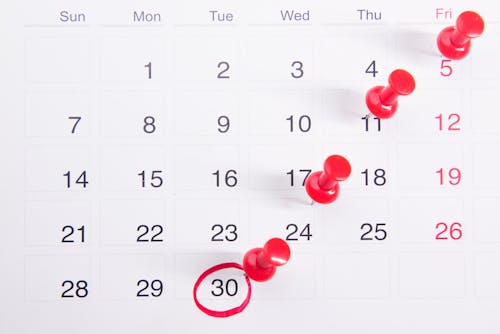 Free Close-up Photo of Red Pins on a Calendar Stock Photo